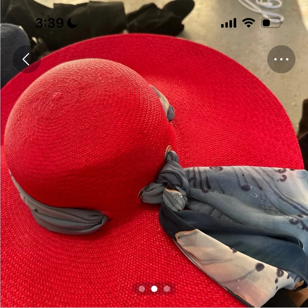 Red hat with blue ribbon